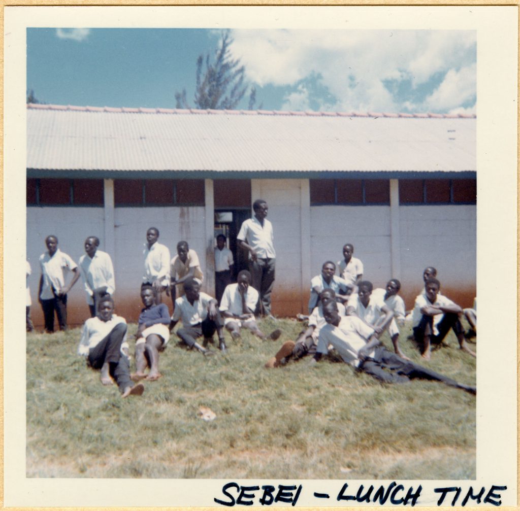 Charlotte Daigle Berney taught at Seibei College in Uganda. Pictured here, students relax outside during lunchtime.